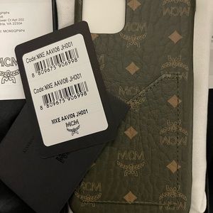Medium MCM Bag with iPhone 11 Pro Max case. Only used 3 times and kept in duster